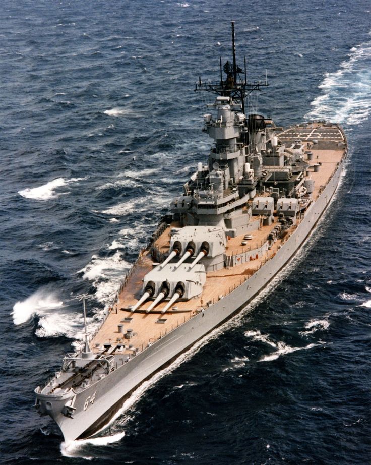 an aerial view of a large ship in the ocean