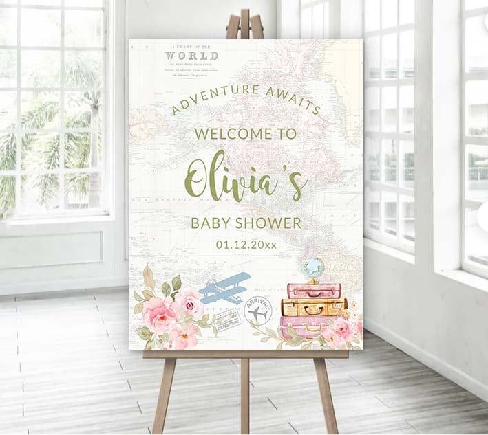 an easel with a welcome sign on it in front of a window that says,'welcome to eliia's baby shower '