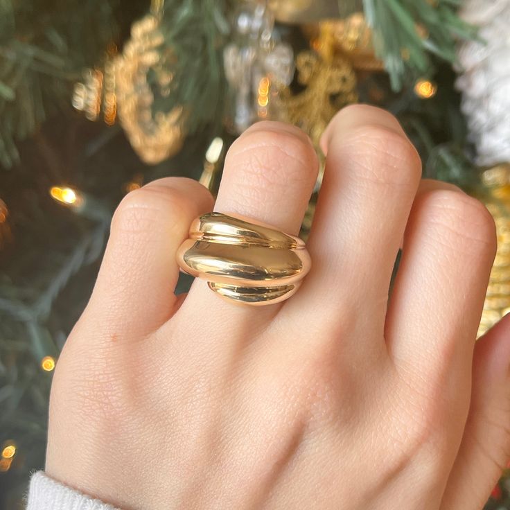 14KT yellow gold polished, artistic, domed cigar band ring. An outstanding, dome ring with incredible presence and earthiness appeal. Wear this piece on its own or with a handful of gold rings! Size 7 Can be resized for an additional fee Width: 14mm Back tapers to 5mm wide Weight: 7.80 grams Stamped 14K Jewels Nails, Staple Earrings, Gold Statement Ring, Gold Rings Fashion, Gold Rings Jewelry, Dome Ring, White Gold Bracelet, Rose Gold Pendant, Chunky Rings