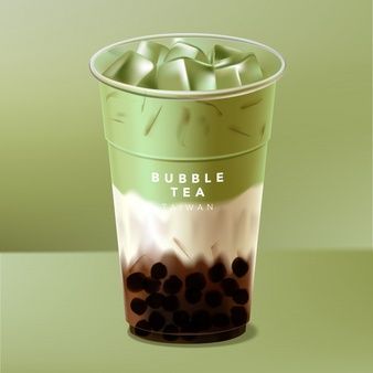 a plastic cup filled with bubble tea on top of a green table next to a wall