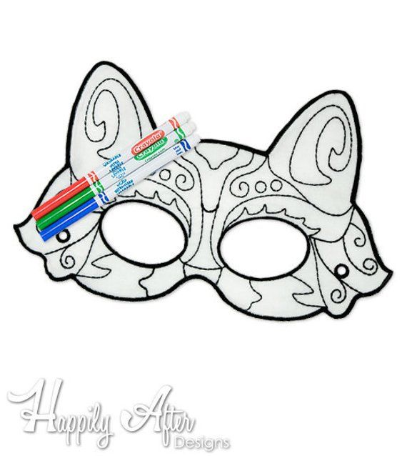 a white mask with an animal design on it's face and a toothbrush in its mouth