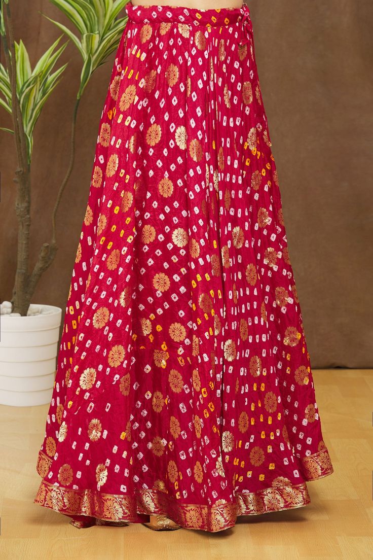 Red flowy bakram lined lehenga skirt with zari floral buttis. Comes with padded sleeveless blouse and a scalloped dupatta.
Components:3
Pattern:Self-design
Type of Work:Floral, Bandhini, Zari
Neckline:U-neck
Sleeve Type:Sleeveless
Fabric: Lehenga and Blouse: Silk, Dupatta: Chiffon, Lining: Cotton
Color:Red
Other Details:
Scalloped dupatta
Golden floral buttis
Padded blouse
Note: The fabric is silk blend and not pure silk
Occasion:Mehendi and Haldi - Aza Fashions Red Floral Lehenga, Scalloped Dupatta, Lehenga And Blouse, Floral Lehenga, Womens Trendy Dresses, Padded Blouse, Lehenga Skirt, Blouse Silk, Red Lehenga