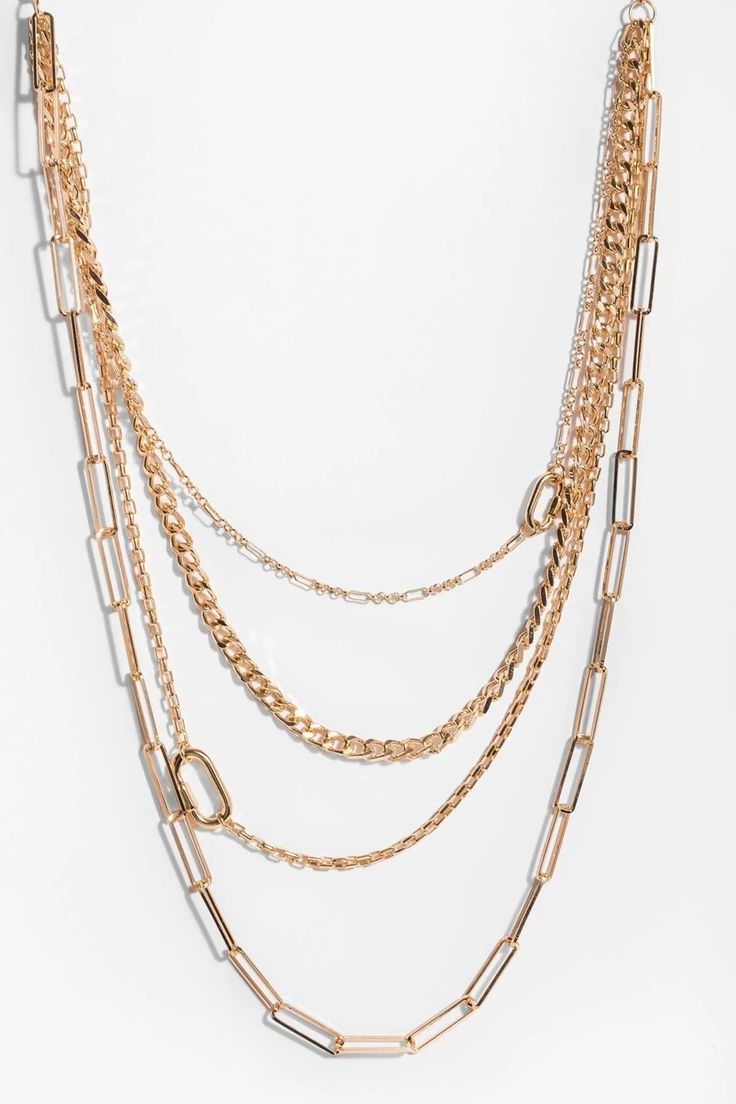 We absolutely adore a modern chain! Our Layered Gold Chain Multi Necklace features four gold link chains stacked together for a trendy look. Pair with your favorite gold accessories for an elegant ensemble, or dress up classic jeans and a tee. Materials: Iron Chain, Zinc Alloy Size: Shortest Chain-16", Longest Chain-26" Lobster Clasp Imported Trendy Multi-strand Layered Chain Necklace, Chunky Chain Metal Necklace For Layering, Chic Multi-strand Layered Necklace, Chic Multi-strand Delicate Chain Necklace, Chic Layered Multi-strand Necklace With Double Chain, Chic Multi-strand Layered Metal Necklace, Chic Multi-strand Layered Necklace With Double Chain, Trendy Gold Chain Necklace, Chic Gold Link Chain Necklace