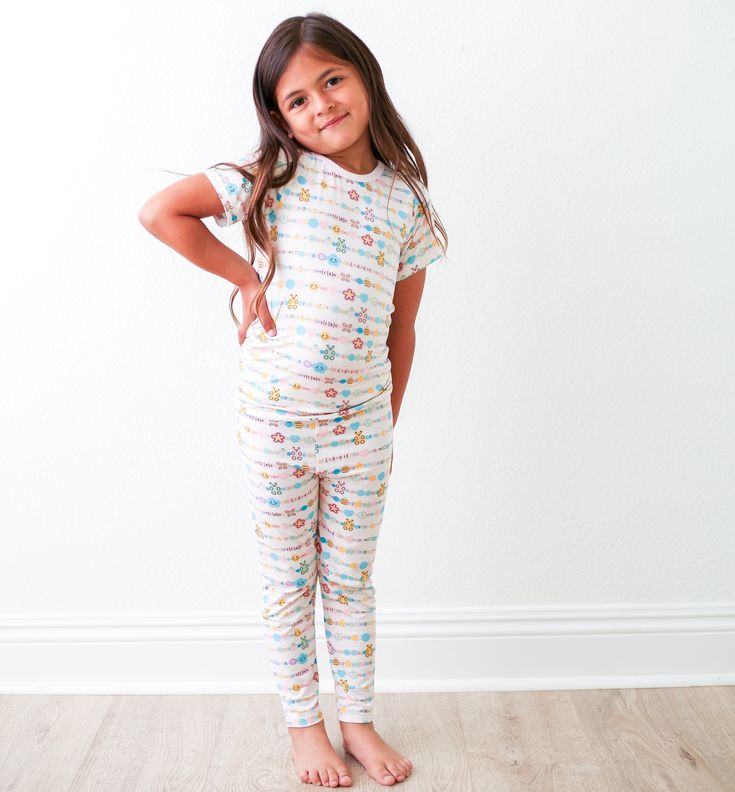 These short sleeve pjs are soft, breathable and super comfy! Made with super soft Bamboo these matching pant and top sets will keep your little one super cozy and snuggly. Short sleeve pajamas for all year lounging. Our pajamas comply with the snug fitting standards for apparel not treated with flame retardants and should be worn snug fitted. 93% Bamboo; 7% Spandex Set includes short sleeve top and pajama pants Wash cold with like colors and fabrics; stays soft wash after wash Tumble dry low or Matching Short Sleeve Loungewear Sets, Short Sleeve Matching Sets For Loungewear, Matching Set Loungewear With Short Sleeves, Short Sleeve Matching Loungewear Sets, Cozy Relaxed Fit Sleepover Sets, Cute Loungewear Sets With Long Pants, Cute Multicolor Short Sleeve Sleepwear, Multicolor Short Sleeve Sleepwear In Relaxed Fit, Multicolor Short Sleeve Sleepwear With Relaxed Fit