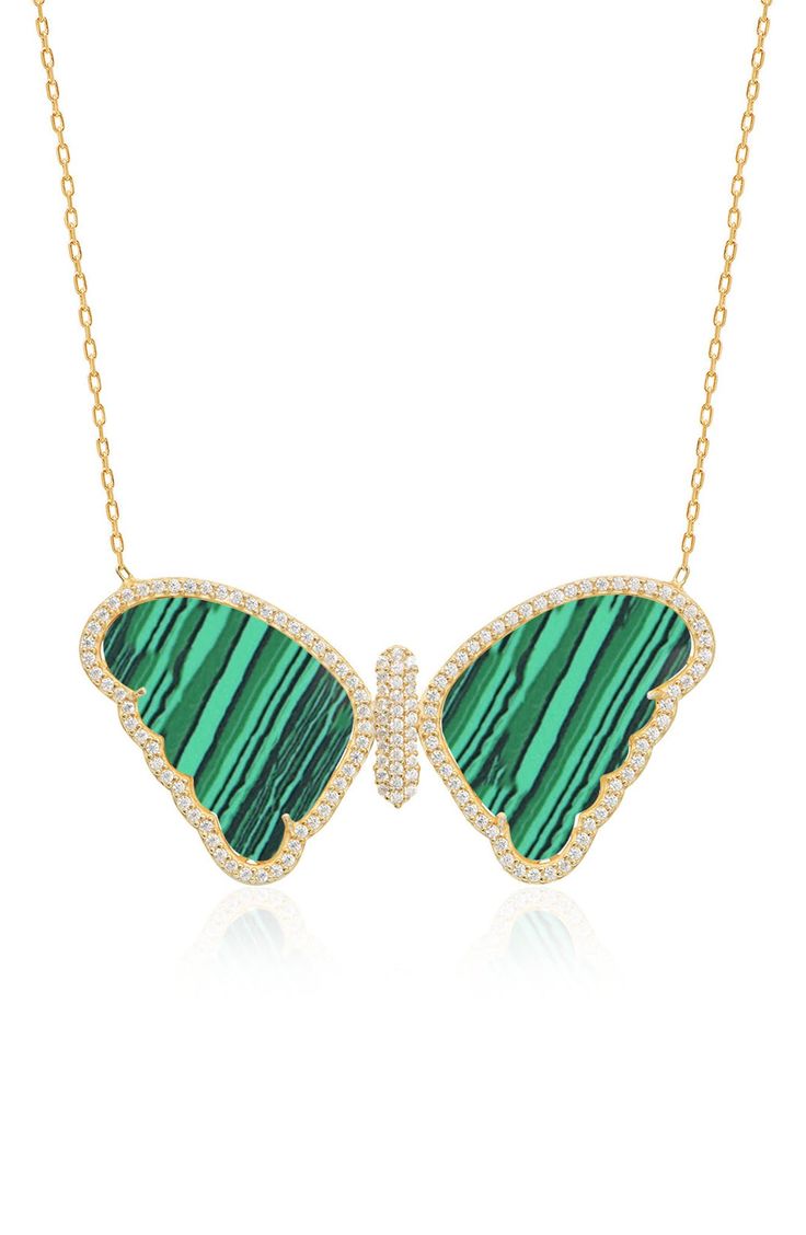 Expect to turn heads when you accessorize with stunning 14K yellow gold plated pendant necklace that's embellished with elegant malachite and pave CZ gems. 14" chain length with 3.5" extension Lobster clasp Sterling silver with 14K yellow gold plating/cubic zirconia/malachite Imported Luxury Malachite Necklaces For Gifts, Elegant Yellow Gold Malachite Necklace, Yellow Gold Malachite Pendant Jewelry, Gold Malachite Gemstone Jewelry, Gold Malachite Jewelry For May Birthstone, Yellow Gold Malachite Necklaces For Gift, Gold Malachite Necklace For May Birthstone, Gold Malachite Necklace As Gift, Gold Malachite Gemstone Necklace