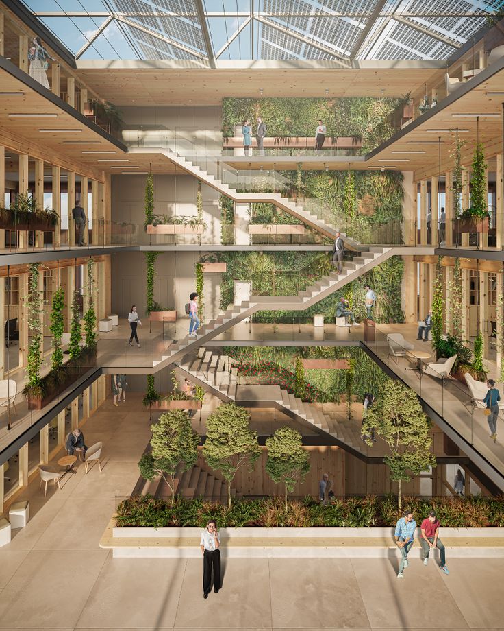 people are walking around an atrium with plants growing on the walls and stairs above them