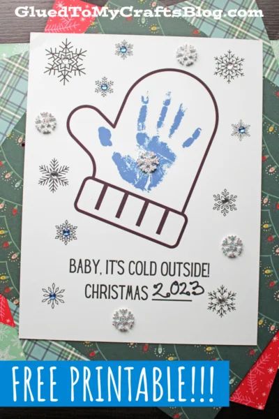 a handprinted christmas card with the words baby it's cold outside