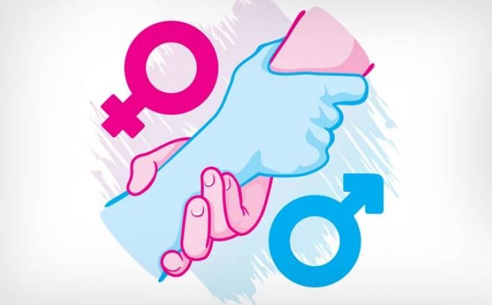 an image of a woman's hand holding a man's hand with the word gender on it