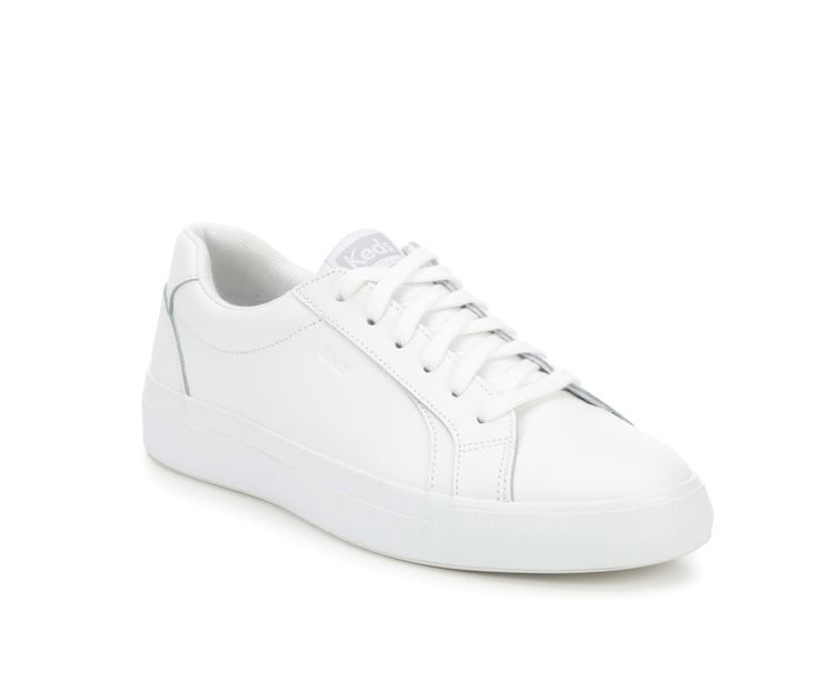 Step into a world of timeless style and comfort with the Keds Persuit Leather Sneakers. These sneakers blend classic design with modern features, creating a versatile and chic footwear option for any occasion. Classic round toe, Lace-up closure for a secure fit, Lightly padded footbed, Flexible and lightweight construction, Smooth lining with a padded insole, Cushioned insole for added comfort, Textured outsole provides traction | Women's Keds Persuit Leather Sneakers in White Size 5.5 Simple White Sneakers, White Tennis Shoes Women, Elegant White Low-top Sneakers, Keds Shoes High Tops, White Leather Low-top Sneakers, White Leather Keds, Classic White Sneakers, Leather Keds, Chic Footwear