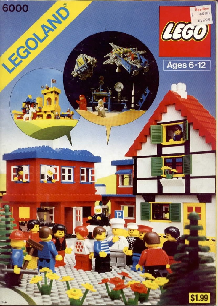 the lego book is open to show an image of people in front of a house