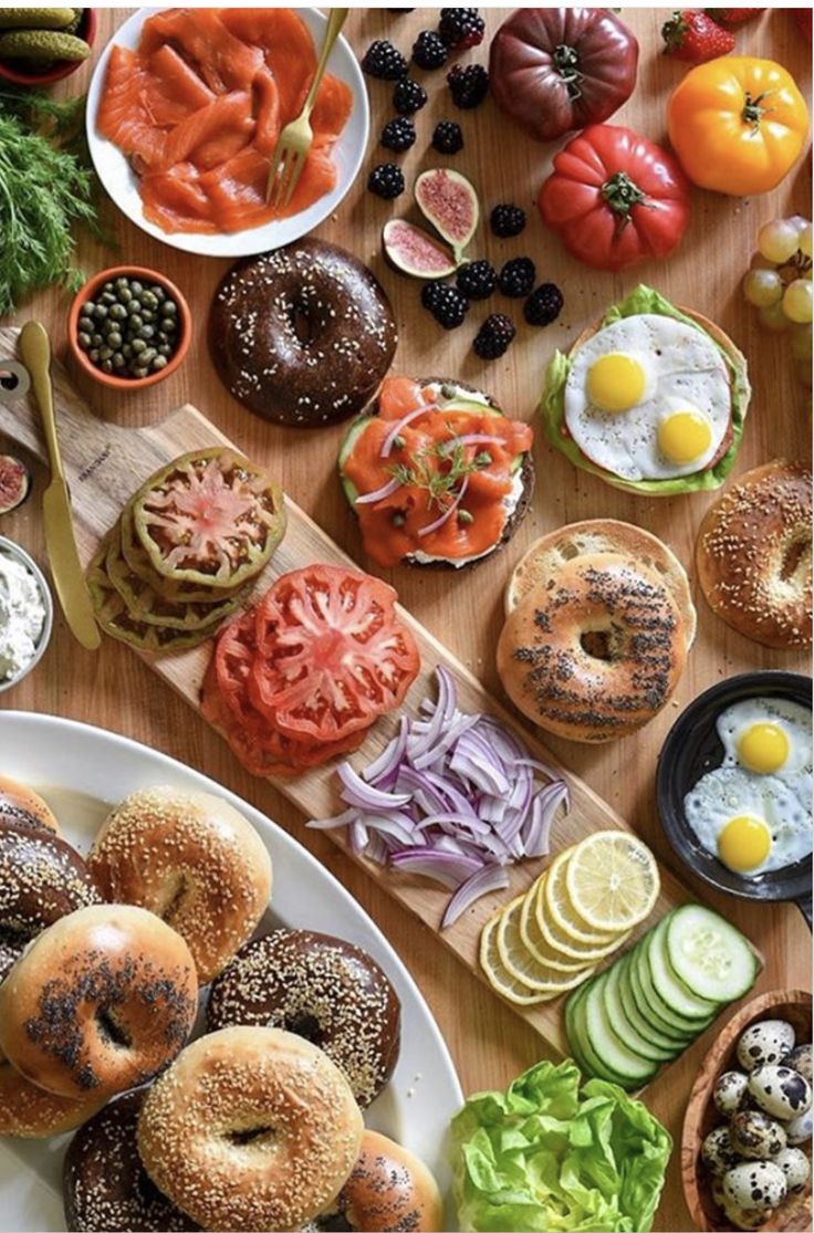 an assortment of food is laid out on a table