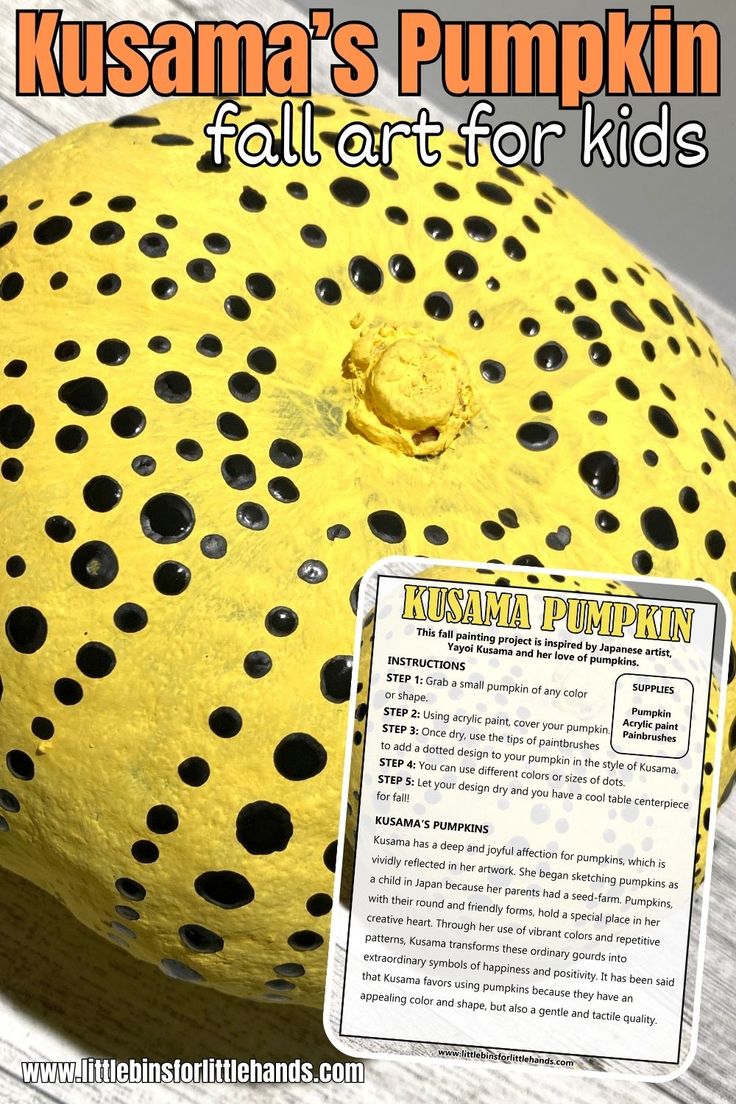 a yellow pumpkin sitting on top of a wooden table next to a sign that says, kusama's pumpkin fall art for kids