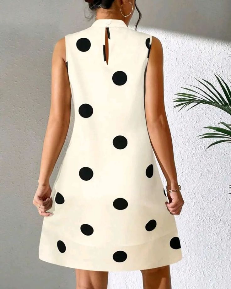 This gorgeous Polka Dot Round Neck Sleeveless Dress is the perfect choice for an elegant evening. Its simple silhouette is timeless and elegant, with a classic neckline and whimsical polka dot pattern. The fabric is delicate and lightweight, ideal for a warm summer night. Make a chic statement at your next event and turn heads in this sophisticated dress. Chic A-line Polka Dot Dress, Polka Dot Sleeveless Dress For Summer Party, Polka Dot Sleeveless Summer Party Dress, Chic Polka Dot Sleeveless Summer Dress, Summer Polka Dot Sleeveless Knee-length Dress, Knee-length Polka Dot Sleeveless Summer Dress, Polka Dot Knee-length Sleeveless Dress For Spring, Spring Sleeveless Polka Dot Midi Dress, Sleeveless Polka Dot Midi Dress For Spring