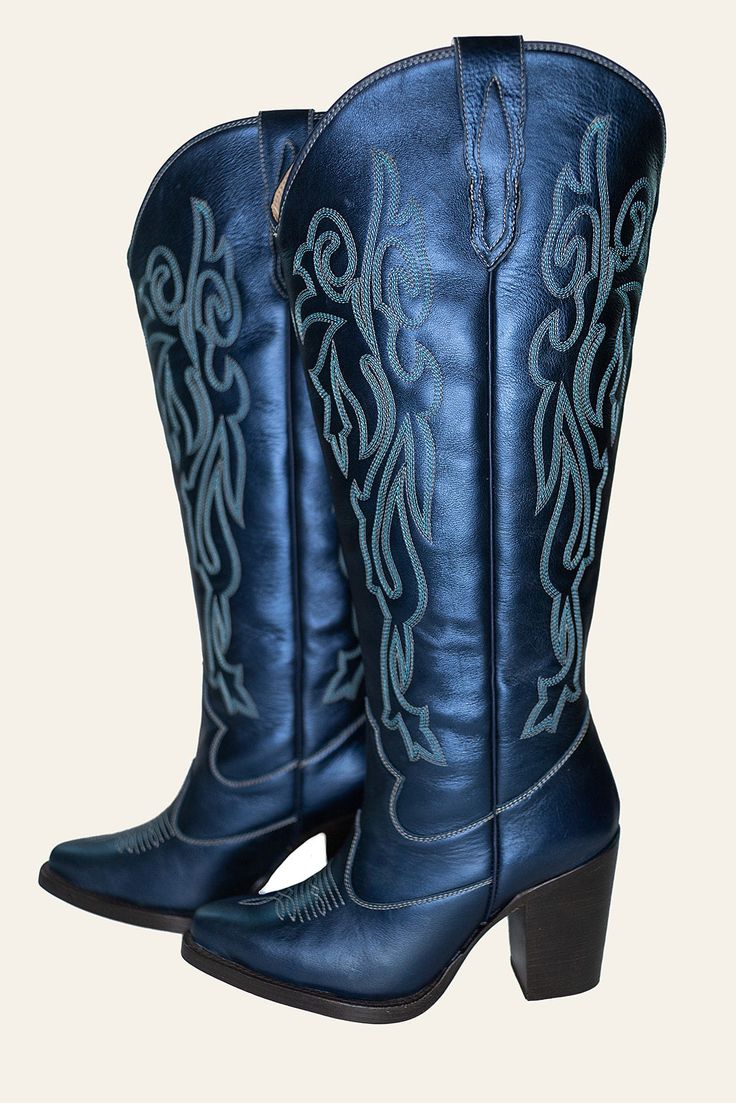 Experience sophistication with our Metallic Navy Leather Women's Wide Calf Cowboy Boots, adorned with exquisite silver and grey stitching Enjoy all-day comfort with an 18-inch calf circumference, ensuring the perfect fit for every wearer Step confidently with a fashionable 3.5-inch heel that adds a chic flair to any outfit Navy Leather, Wide Calf, 5 Inch Heels, Bristol, Cowboy Boots, Leather Women, Cowboy, Perfect Fit, Stitching