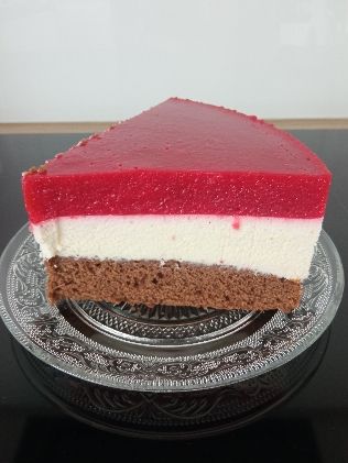 a piece of cake sitting on top of a glass plate