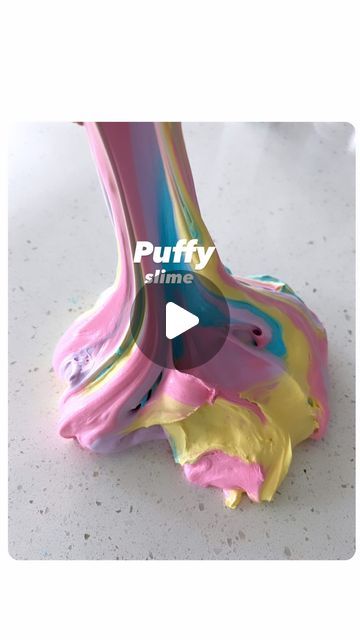 the foot is covered in multicolored paint and has a video message that reads putty time