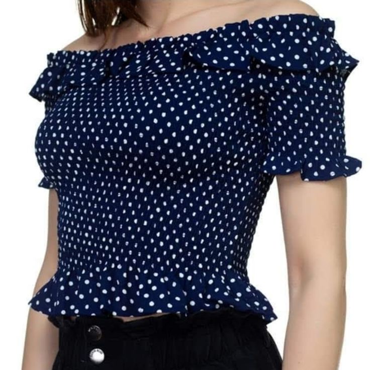 100% Polyester Woven Smocked Top Ruffle Off The Shoulder Neckline That Fall Into Short Sleeve Small Ruffle Flounce Layer Cropped Ruffle Hem Color: Navy Casual Off-shoulder Ruffle Tops, Casual Off-shoulder Blouse With Ruffles, Casual Off-shoulder Smocked Top, Fitted Off-shoulder Smocked Casual Top, Fitted Off-shoulder Casual Smocked Top, Blue Short Sleeve Top With Smocked Bodice, Short Sleeve Smocked Top With Ruffles For Vacation, Ruffled Smocked Short Sleeve Top For Vacation, Blue Short Sleeve Smocked Chic Top