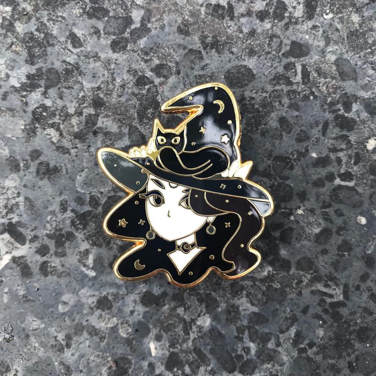 A pretty gold plated hard enamel pin with two gold clutches in the back. Perfect for witch lover or anyone! - 1.5 inch hard enamel  - Gold Plating - Comes with two gold clutches back - Comes with a little illustration card --------------------------------- insta : @kazel_  --------------------------------- Estimated shipping times:  Domestic Standard & Registered: 7 - 21 Working days. Gold Enamel Brooch Pin, Gold Enamel Lapel Pin, Gold Party Brooch Pin, Gold Enamel Pin With Metal Pinmount Logo, Collectible Gold Enamel Pins, Black Halloween Pins As Gifts, Gold Novelty Brooches For Gifts, Vintage Black Enamel Pin For Gift, Themed Enamel Pin As Gift