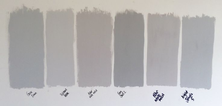 several shades of gray paint on a white wall