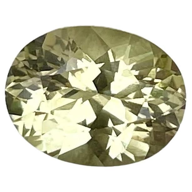 an oval shaped green diamond on a white background