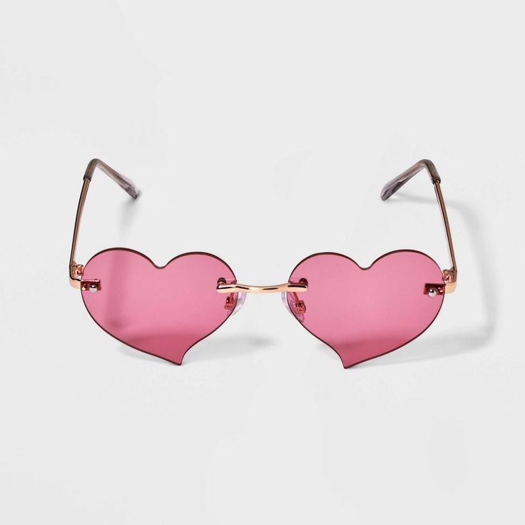 Upgrade your summer look with the Girls' Rimless Heart Sunglasses by art class™ in Pink. Rock the trendy heart-shaped, rimless design and pink lenses for a look that screams cool. The sturdy metal frame in gold, with adjustable nose pads ensures a comfy fit for endless adventures under the sun. With maximum UV protection, these shades are a must-have accessory for girls aged 10-18. Gift yourself or surprise a friend with this Girls' Rimless Heart Sunglasses from art class and own the spotlight. Heart Shaped Clothes, Star Shaped Sunglasses, Pink Heart Glasses, Heart Stuff, Pink Lenses, Heart Shaped Glasses, Heart Glasses, Star Struck, Cool Glasses