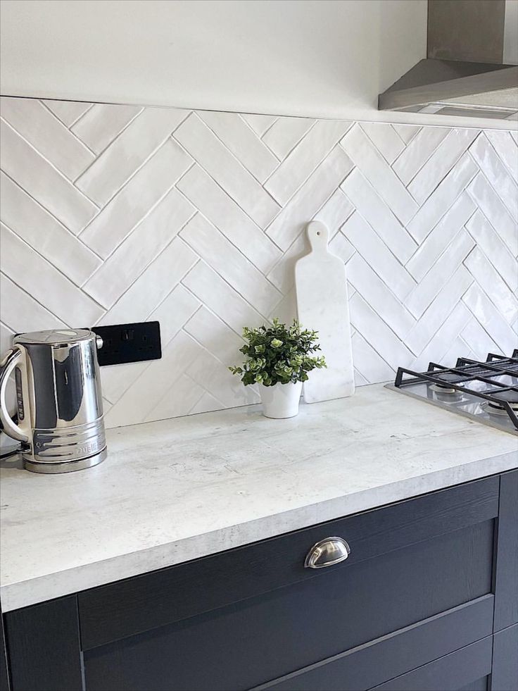 the kitchen counter is clean and ready to be used as a coffee pot or tea kettle