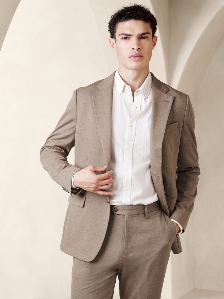 Tailored-Fit Knit Suit Jacket | Banana Republic Factory Solid Color Business Suits For Fall, Slim Fit Outerwear With Suit Collar, Slim Fit Solid Blazer For Business Casual, Solid Color Winter Suits For Office Wear, Winter Office Wear Classic Suit, Winter Office Wear Suits, Modern Slim Fit Blazer For Workwear, Slim Fit Wool Outerwear For Work, Long Sleeve Suits For Workwear