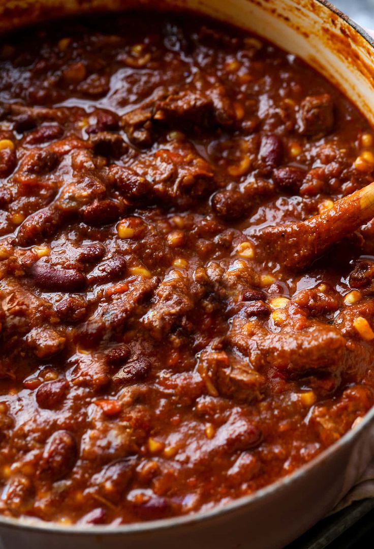 a large pot filled with chili and beans