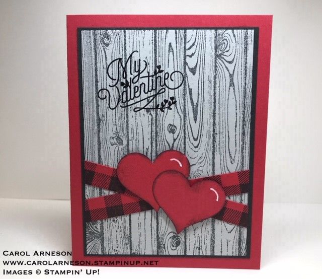 a valentine's day card with two red hearts