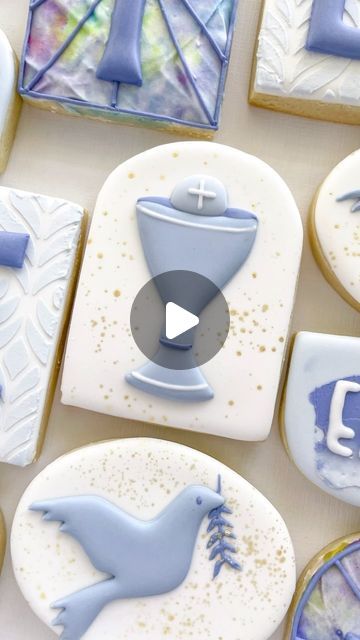 decorated cookies with blue and white designs on them