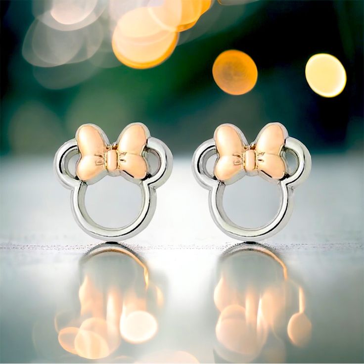 Disney’s Minnie Mouse Alloy Steel Hypoallergenic Stud Earrings With Bow Detail. These Adorable Studs Feature Minnie’s Signature Bow With A Rose Gold Plated Finish Creating A Contemporary Contrasting Look. The Minnie Mouse Stud Earring Design With An Open Silhouette Makes A Chic Addition To Any Outfit. Brand New. Never Worn. Bundle 2 Or More Items For A Special Discount And Save On Shipping! Free Gift With Every Purchase. Please See The “Free Gift With Purchase” Post For Details. Silver Disney Mickey Mouse Jewelry, Disney Mickey Mouse Silver Jewelry, Silver Themed Earrings As A Gift, Mouse Jewelry, Gift With Purchase, A Rose, Stud Earring, Bow Detail, Designer Earrings