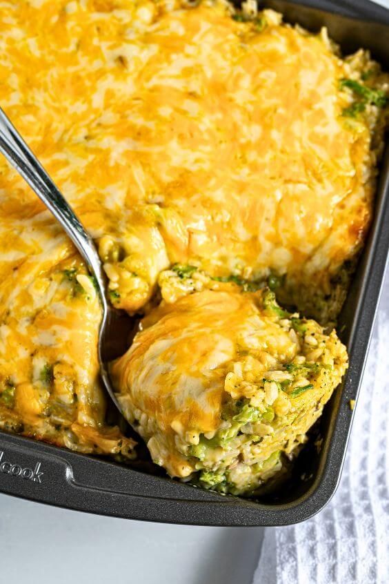 a casserole dish with broccoli and cheese