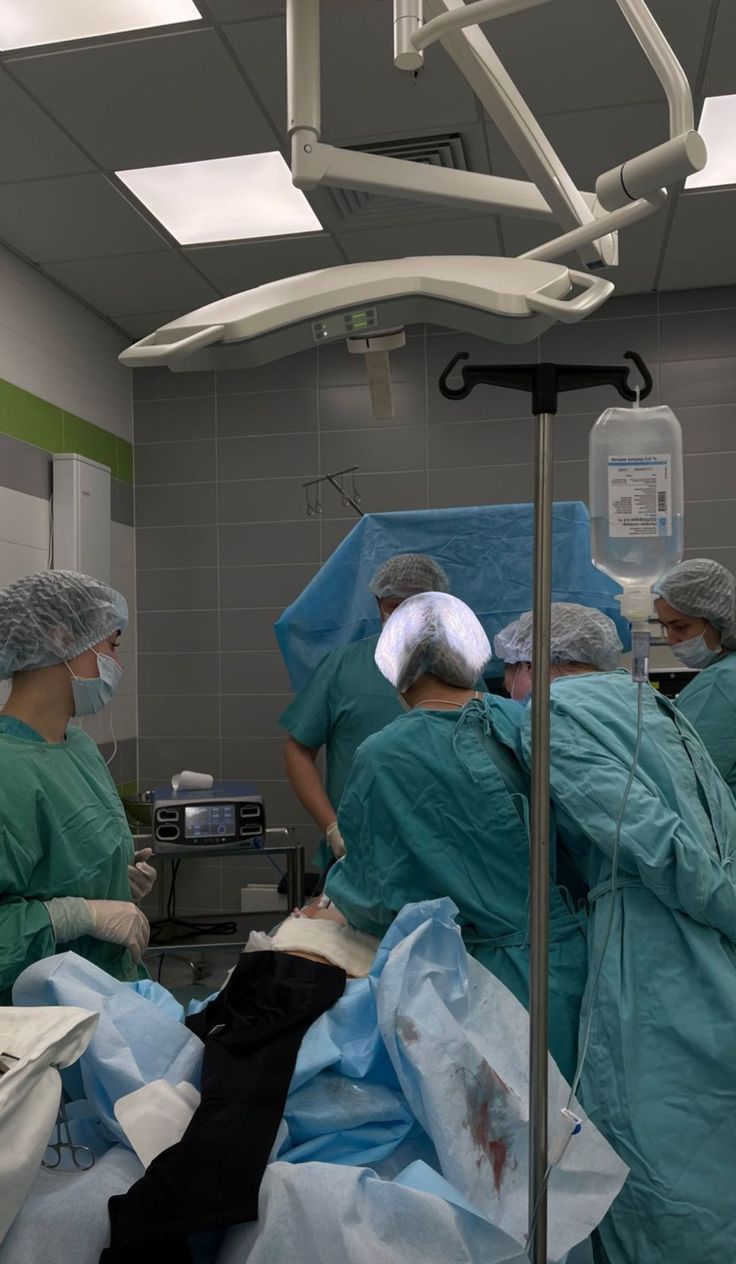 doctors performing surgery in an operating room