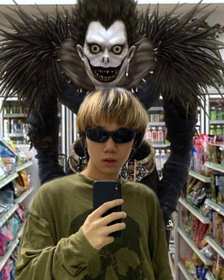 a person standing in a store looking at a cell phone with an evil monster behind them