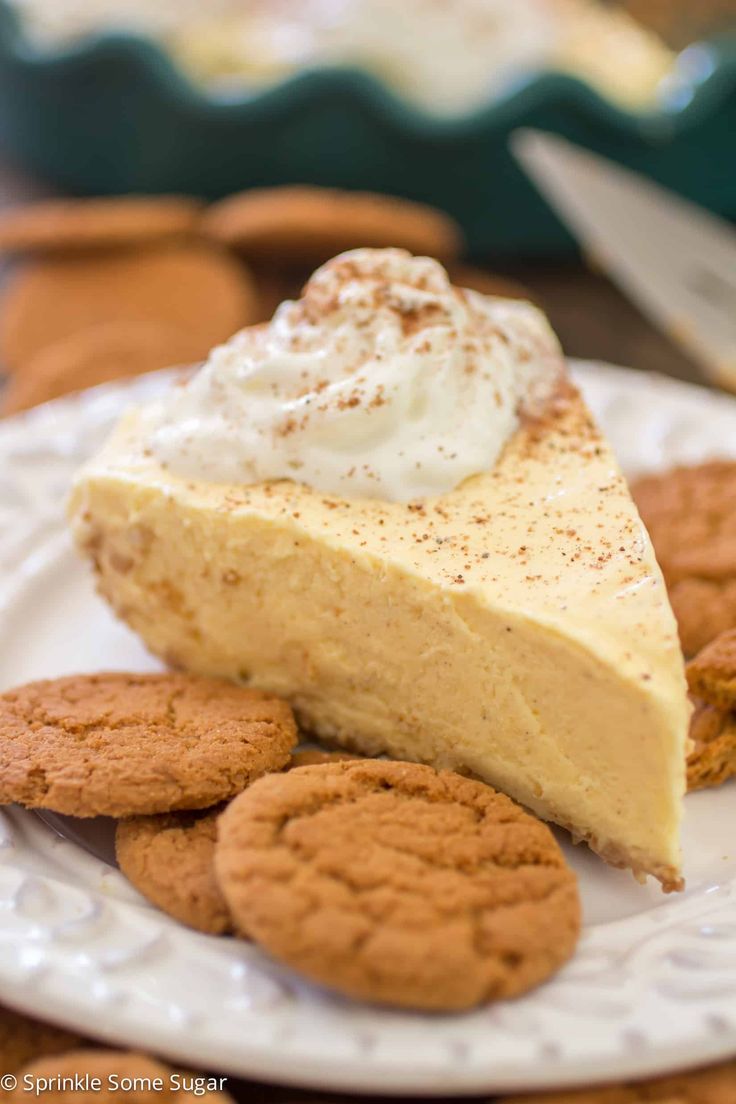 a slice of pie and cookies on a plate