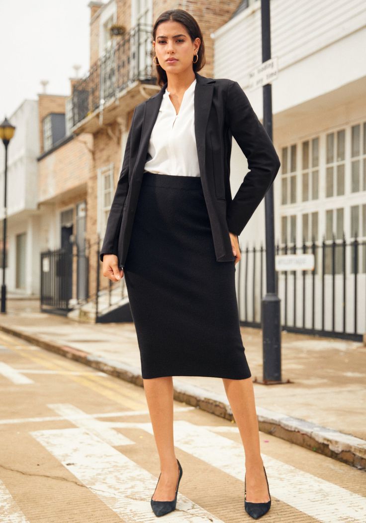 Embrace a look that's as powerful as it is posh with the SoftBlend Merino Pencil Skirt. With its luxurious and eye-catching ribbed texture, this skirt sculpts your silhouette, creating an endlessly flattering, vertical sophistication. High-waisted pencil skirt with a slim fit, designed to hit below the knee. 28½” Length (size S). Merino wool blend (black). 50% merino wool, 50% acrylic. Turn inside out, then machine was cold, gentle cycle with similar colors. Use fabric softener. Do not bleach. R Pencil Skirt Outfits For Work Business, Chic Tailored Pencil Skirt Suit, Elegant Tailored Skirt Suit With Pencil Skirt, Elegant Tailored Pencil Skirt Suit, Tailored Elegant Pencil Skirt For Workwear, Elegant Tailored Pencil Skirt For Work, Chic Tailored Pencil Skirt For Formal Occasions, Elegant Business Skirt Suit With Pencil Skirt, Elegant Pencil Skirt Suit For Office