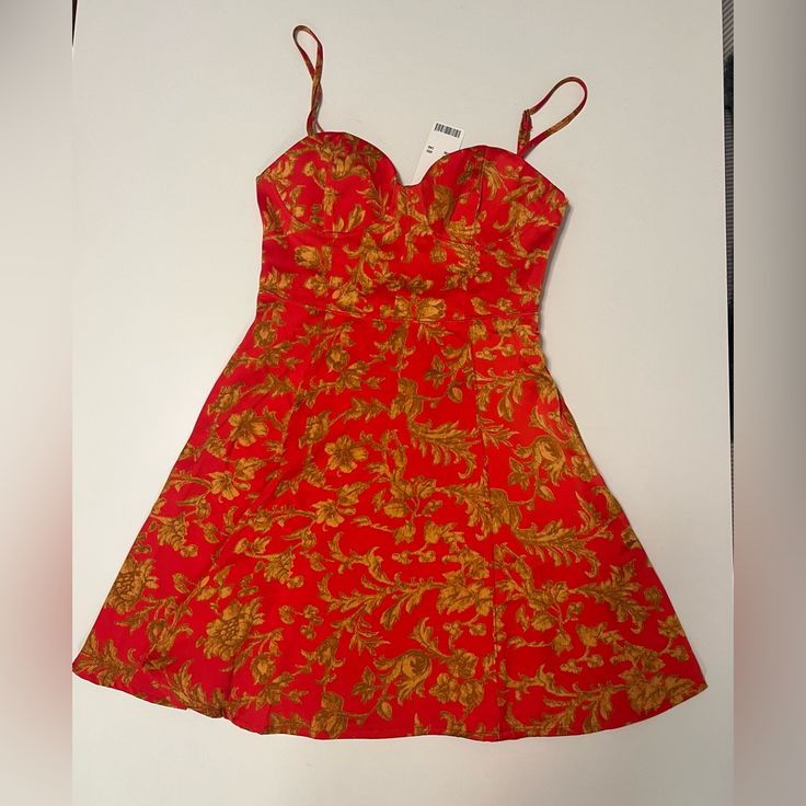 Nwt Urban Outfitters Orion Bustier Mini Dress Xs Red And Gold Adjustable Spaghetti Straps. Retailed For $69 Red Fitted Mini Dress With Floral Print, Red Fitted Floral Print Mini Dress, Red Fitted A-line Sundress, Fitted Red Sundress, Red Fitted Sundress With Lining, Red Fitted Sundress With Spaghetti Straps, Fitted Red Mini Dress For Vacation, Urban Outfitters Red Party Dress, Red Casual Mini Dress With Sweetheart Neckline