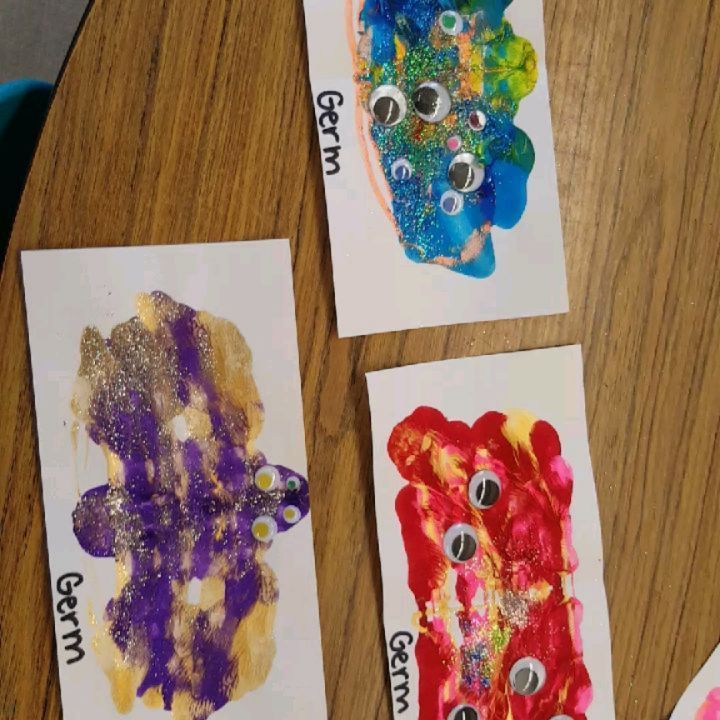 three pictures of different colored animal faces on paper with googly eyes and the words gummy