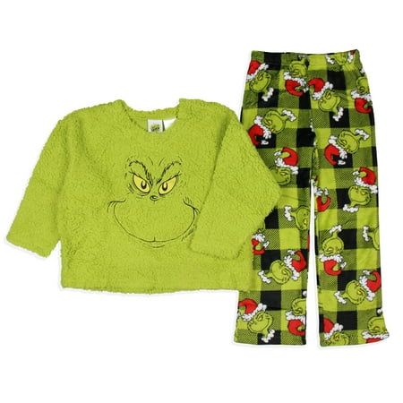 a child's pajama set with the grin face on it