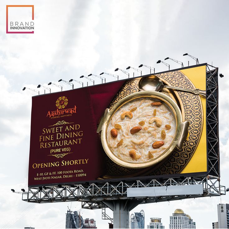 an advertisement for a fine dining restaurant featuring a bowl of food on the side of a billboard