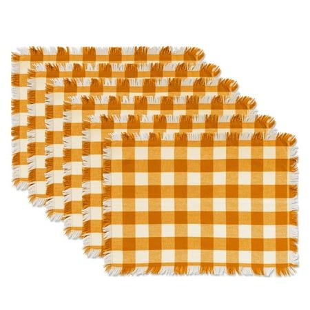 three yellow and white checkered placemats with fringe ends on each one side