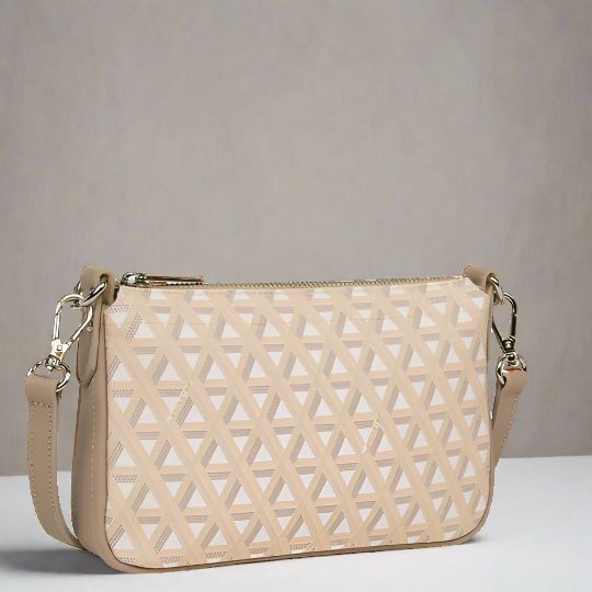 Ikon Beige Small Clutch Bag Complete your look with our Ikon Beige Small Clutch Bag. Designed to be both functional and sophisticated, this light neutral accessory pairs perfectly with any outfit. Elevate your style and keep your essentials close by with this must-have clutch. Product Details: Made in France Dimensions: 8.66" Width x 5.51" Height x 1.77" Depth One Interior Zip Pocket Adjustable Strap Zippered Closure Versatile Beige Crossbody Baguette Bag, Versatile Beige Baguette Crossbody Bag, Trendy Cream Baguette Bag With Adjustable Strap, Modern Cream Rectangular Baguette Bag, Chic Beige Baguette Bag With Adjustable Strap, Modern Beige Crossbody Baguette Bag, Modern Beige Baguette Crossbody Bag, Modern Beige Baguette Shoulder Bag, Modern Cream Baguette Bag With Detachable Strap