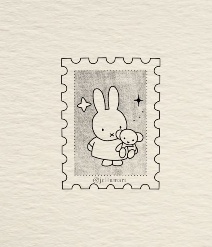 a stamp with an image of a bunny holding a teddy bear