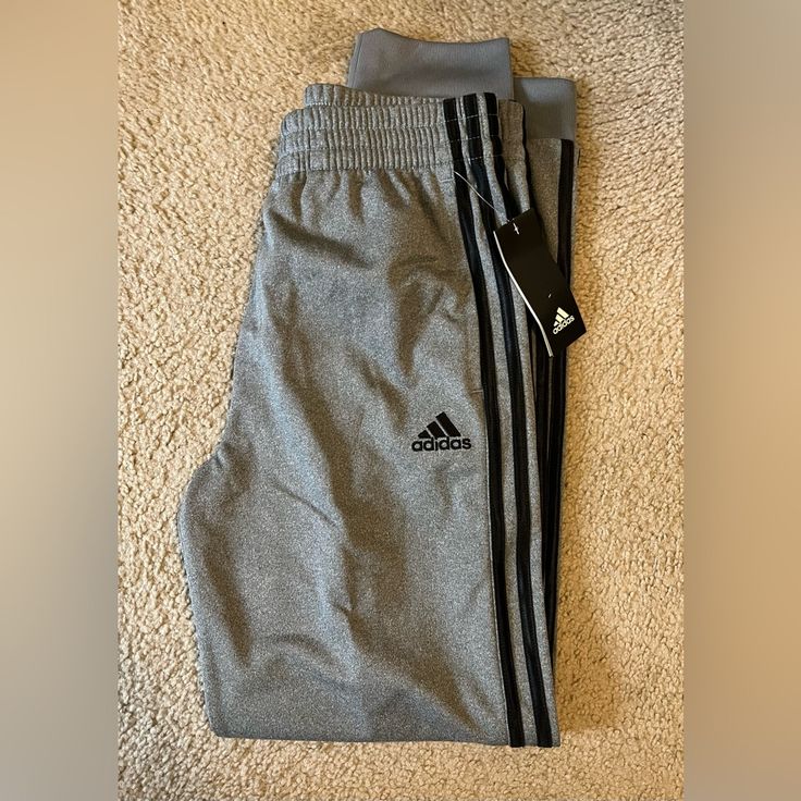 Brand New W/ Tags Adidas Joggers Size Youth Large- 14/16 Color- Gray/Black Adidas Gray Bottoms For Sports, Adidas Sports Pants In Gray, Adidas Gray Sports Bottoms, Adidas Gray Sports Pants, Black Adidas Pants, Adidas Black Joggers With Logo, Black Cotton Adidas Sweatpants, Adidas Logo Black Jogging Pants, Black Adidas Logo Sweatpants