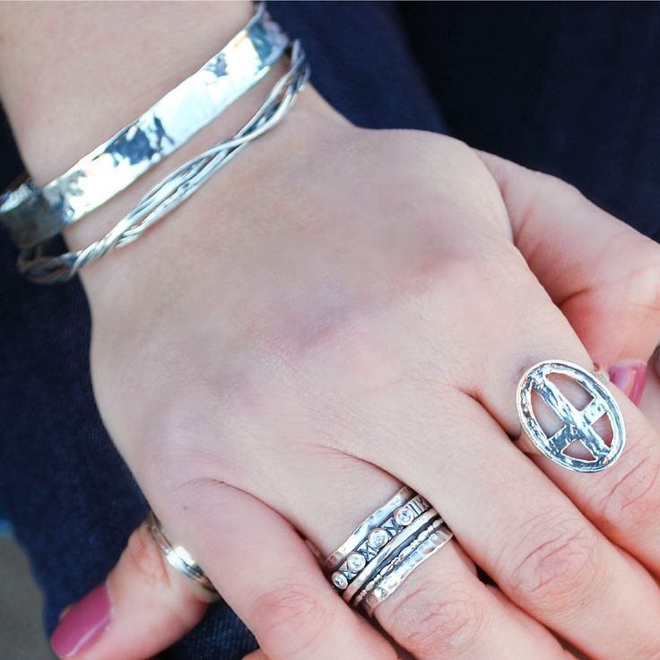 With twists and turns, our Artistry Bracelet shines with an interesting vine-like pattern. Artisan-crafted of sterling silver it's perfect for wearing alone or layer it with your other bracelets for your unique style. Bangle Bracelet is 2 3/4" in diameter. Style #B119 Sterling silver Bangle Style ".925" sterling silver quality stamp Artisan-crafted bangle bracelet comes with a “.925” sterling silver stamp as a symbol of guaranteed product quality. Artisan Silver Bangle Hand Wrapped, Everyday Silver Twisted Jewelry, Everyday Twisted Silver Jewelry, Artisan Hand-wrapped Silver Bangle, Twisted Silver Jewelry For Everyday, Sterling Silver Bracelet With A Modern Twist, Silver Spiral Bohemian Bracelets, Silver Hand Wrapped Cuff Bracelet, Hand Wrapped Silver Cuff Bracelet