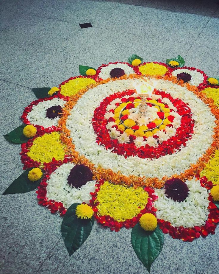 a colorful flower arrangement on the ground