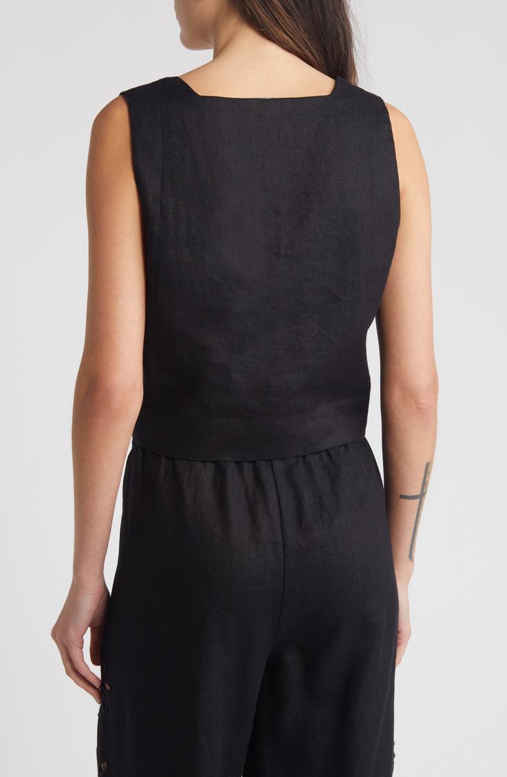 This lightweight linen tank top features a modern square neck, wide shoulder straps and an on-trend cropped hem. 18 1/2" length (size Medium) Square neck Lined 100% linen Dry clean Imported Chic Linen Crop Top, Chic Linen Tank Top, Fitted Black Linen Top, Chic Cropped Linen Tops, Chic Sleeveless Linen Crop Top, Fitted Linen Crop Tank Top, Chic Fitted Linen Tank Top, Fitted Linen Elegant Crop Top, Black Linen Casual Tank Top