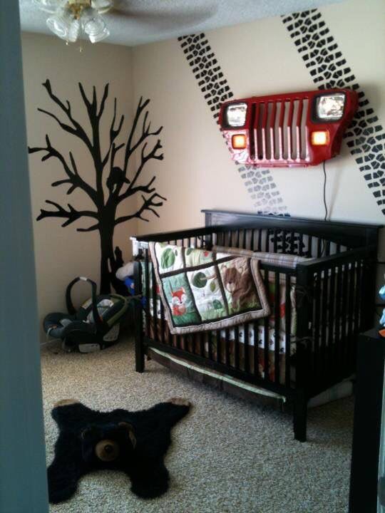 a baby's room decorated in black and white