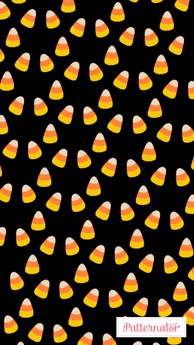 an orange and yellow candy corn pattern on a black background