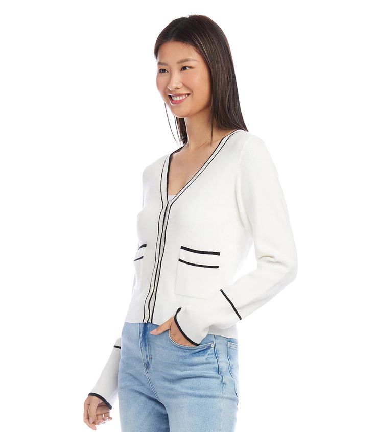 This versatile cardigan effortlessly blends both comfort and elegance with its contrasting trim and convenient patch pockets. Ideal for a casual day out or a polished office look, this essential layering piece adds a touch of sophistication to any ensemble. Color - Black and off white. V-neckline. Long sleeves. Contrast trim. Ribbed cuffs and hem detail. Front patch pockets. Fabric - 50% Viscose. 25% Polyester. 25% Nylon. Care - Dry clean. Petite Sweaters, Cardigan Design, Button Front Cardigan, Karen Kane, Of Outfits, Style Cardigan, Ribbed Knit Sweater, Cardigan Fashion, Contrast Trim